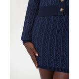 Minissaia de malha com tranças Guess