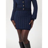 Minissaia de malha com tranças Guess